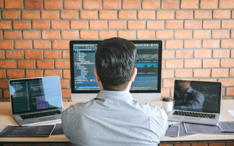 Professional Developer programmer working a software website design and coding technology